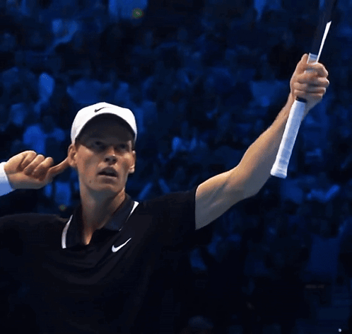 Man Holding Tennis Racquet On Court, Emirates Sign GIF
