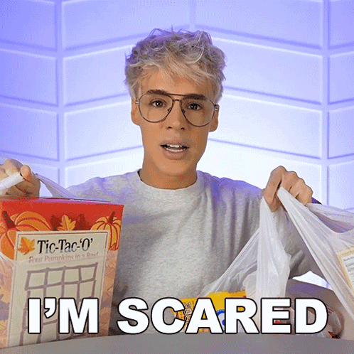 Man Holding Tic Tac O's And Food Saying I'm Scared GIF