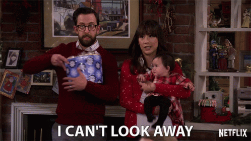 Man Holding Toilet Paper and Woman Holding Baby Say I Can't Look Away