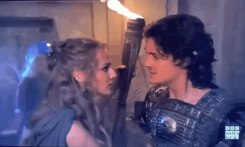 Man Holding Torch And Woman Looking At Each Other BBC America GIF