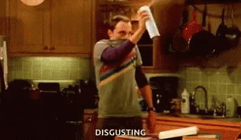 Man Holding Towel Over Face Disgusting GIF