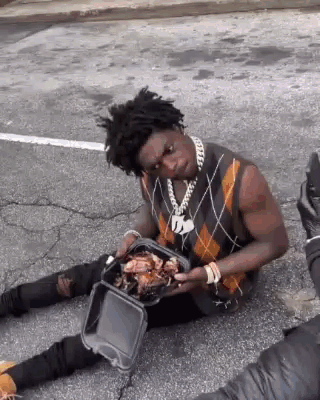Man Holding Tray of Food