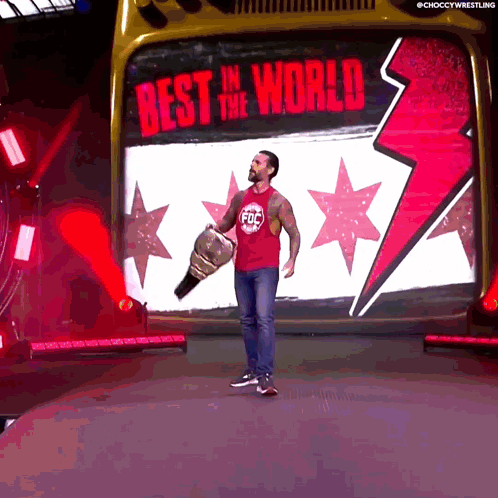 Man Holding Trophy Best in World