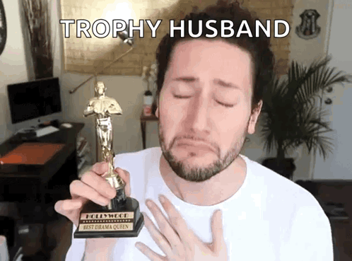 Man Holding Trophy Husband GIF