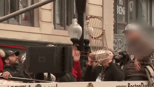 Man Holding Trophy