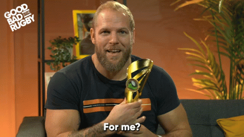 Man Holding Trophy Saying For Me