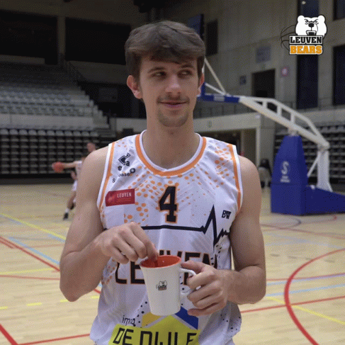 Man Holding Trophy Talking To Two Men GIF