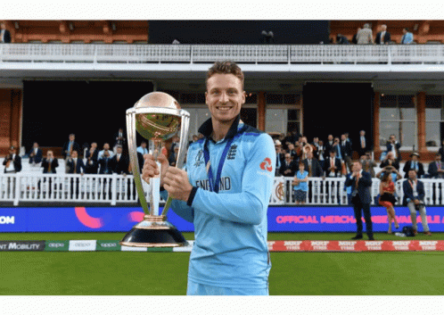 Man Holding Trophy with England on Shirt