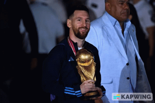 Man Holding Trophy with Kapwing Logo