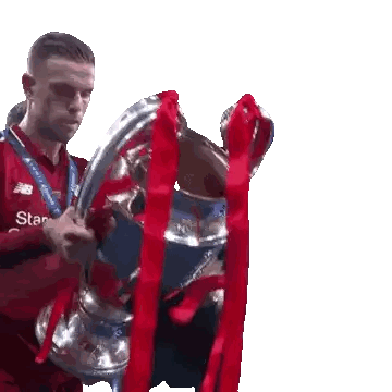 Man Holding Trophy with Star Shirt
