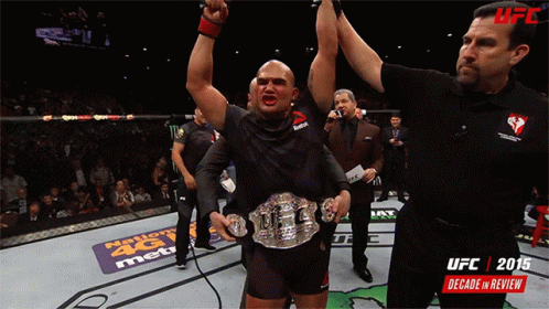 Man Holding UFC Belt