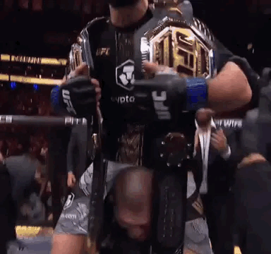 Man Holding UFC Championship Belt GIF