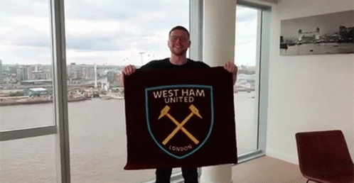 Man Holding West Ham Flag