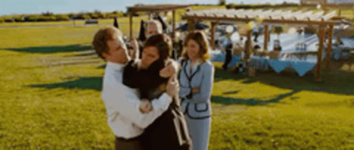 Man Holding Woman in Arms