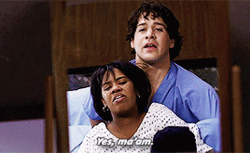 Man Holding Woman In Hospital Gown Saying Yes Ma Am GIF