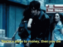 Man Holding Woman Saying Youre A Slave To Money GIF