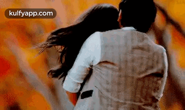 Man Holding Woman While Dancing
