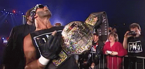 Man Holding Wrestling Belt