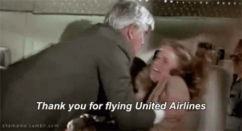 Man Hugging Woman On Plane Saying Thank You GIF