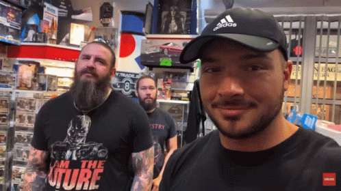 Man in Adidas Hat in Store