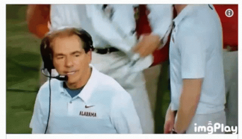 Man In Alabama Shirt Talking Into Microphone GIF