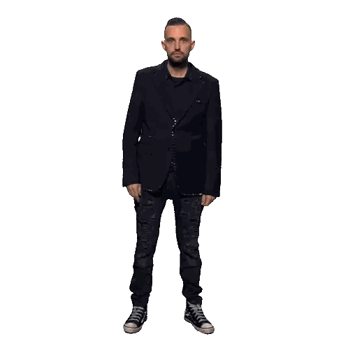 Man in All Black with Hands in Pockets