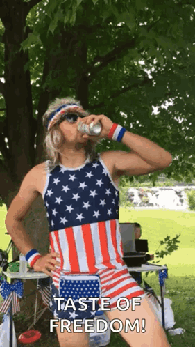 Man in American Flag Outfit Drinking Soda