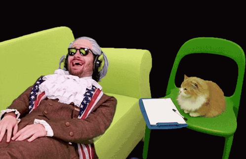 Man in American Flag Outfit Sitting on Green Couch