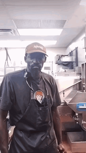 Man in Apron and Hat Saying Wendy's