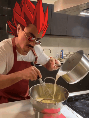 Man in Apron Pouring Liquid into Pan
