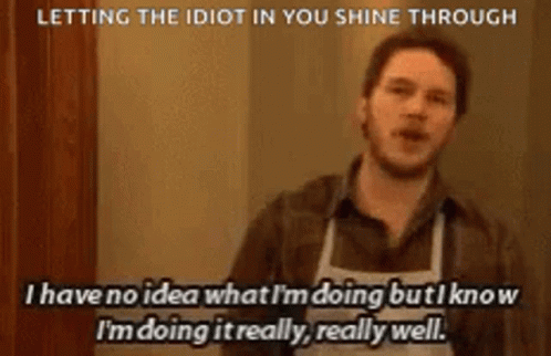 Man in Apron Saying Letting Idiot Shine