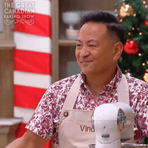 Man In Apron Saying Vino Smiling GIF