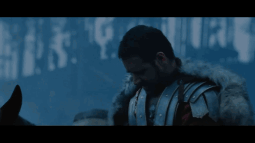Man In Armor With Unleash Hell Sign GIF
