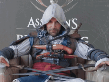 Man in Assassin's Creed Costume Holding Swords