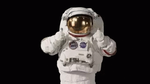 Man in Astronaut Suit Thumbs Up