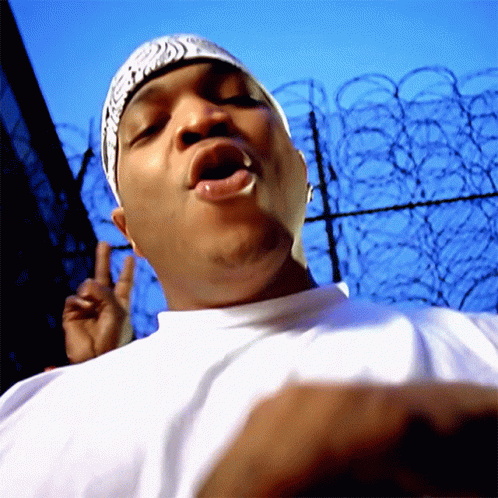 Man In Bandana Giving Peace Sign GIF