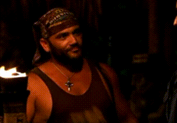 Man In Bandana Holding Torch GIF