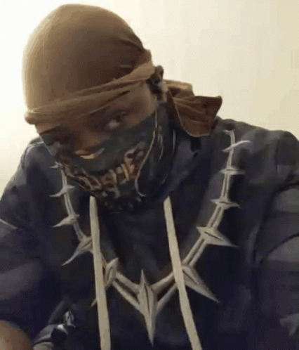Man in Bandana, Hoodie, and Necklace
