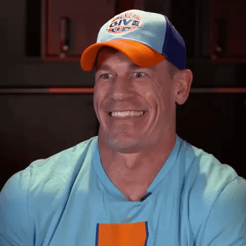 Man In Baseball Cap And Blue Shirt Making Funny Face GIF