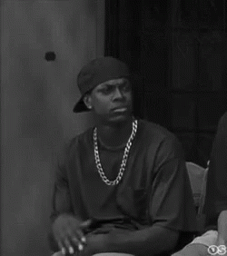 Man in Baseball Cap and Chains
