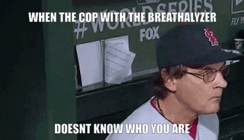Man in Baseball Cap and Glasses Says When the Cop With the Breathalyzer