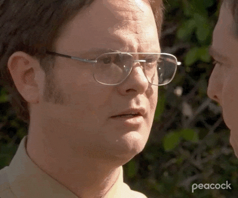 Man In Baseball Cap And Striped Shirt Writing On Face GIF