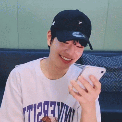 Man In Baseball Cap And T1293vm T-Shirt GIF