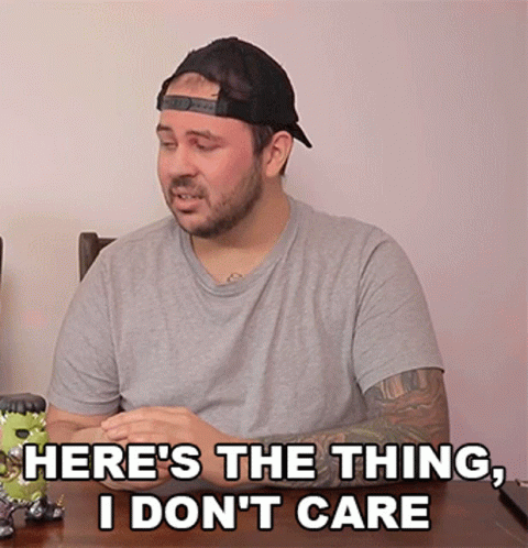 Man in Baseball Cap at Table Saying Here's the Thing I Don't Care