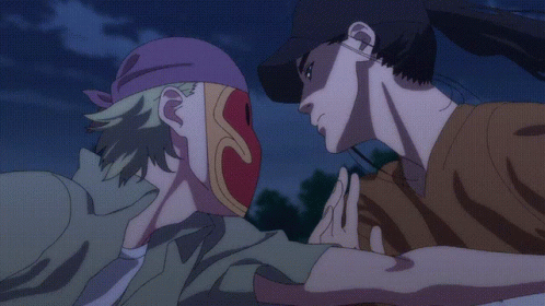 Man in Baseball Cap Holding Another Man's Arm