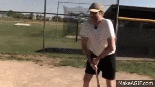 Man In Baseball Cap Holding Baseball Bat GIF