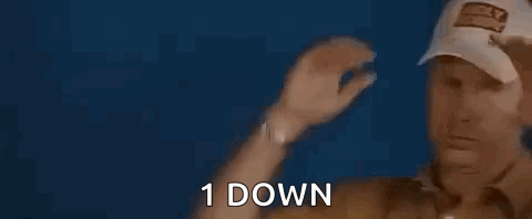Man In Baseball Cap Holding Head Saying 1 Down GIF
