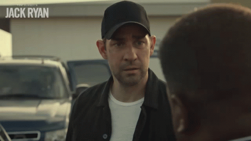 Man in Baseball Cap Saying For What