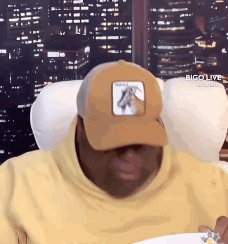 Man in Baseball Cap With Horse Picture