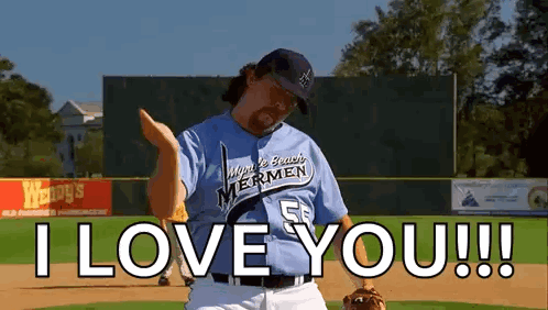Man in Baseball Uniform on Baseball Field